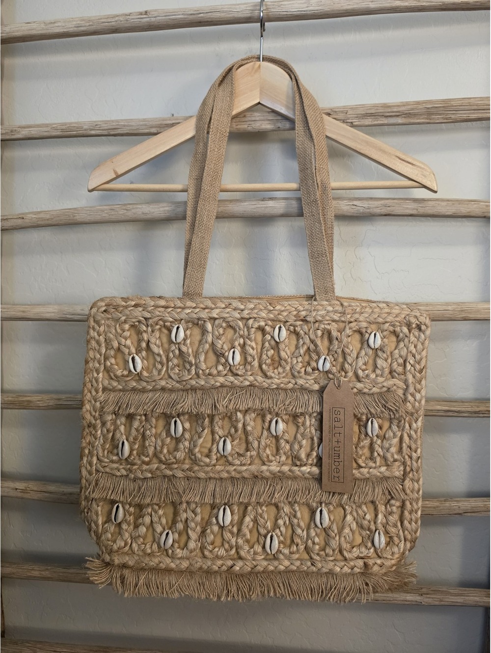 Salt+Umber woven straw tote bag with shell accents